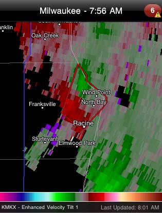 Tornadic Storm over Racine County. The velocity data shows a tornadic signature with the green colors going toward the radar and the red blowing away from the radar.